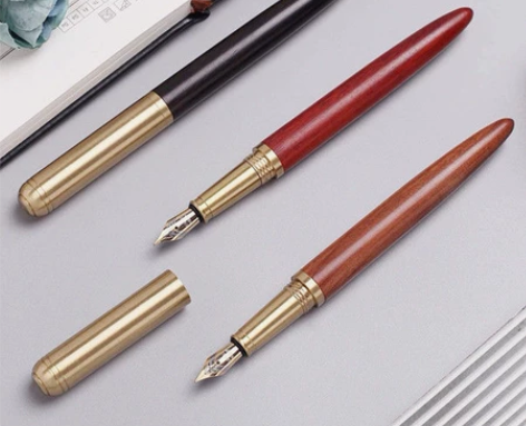 出钢笔自用，正常可用。 黄铜实木钢笔，特点...