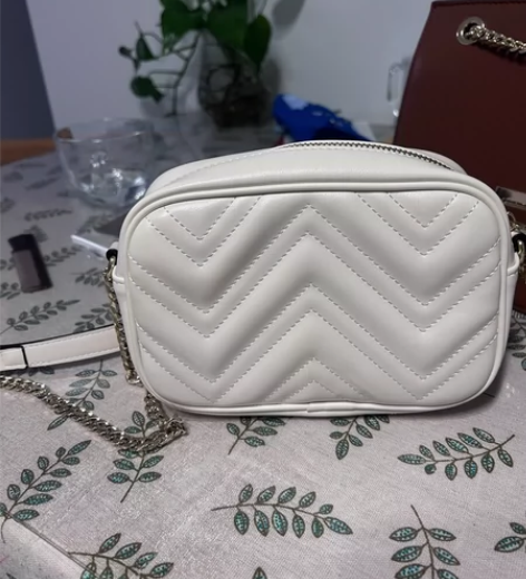 稻草人包包，我嫌扣子不好看自己下掉了，低价...