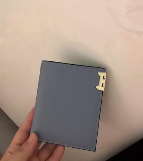 袋鼠真皮女包钱包微瑕。 上下油边不平整 ...