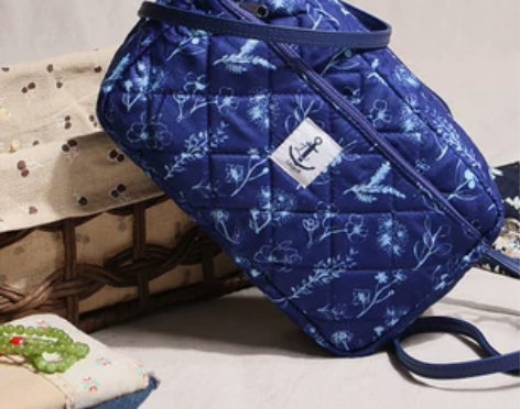 素雅蓝色棉布挎包蝴蝶结防水化妆包小挎包帆布...