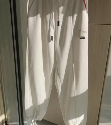 青少年男士休闲白色束脚九分裤，XL175码...