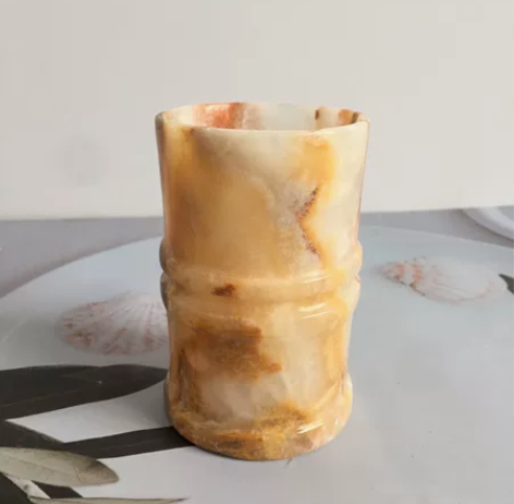 笔筒。人脑袋笔筒不知道什么料的。以图为主，...