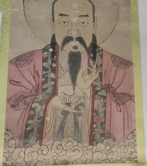 这幅古画展现了中国古代文化中的三位尊贵的仙...