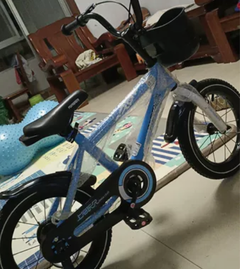 小朋友过生日亲戚送的全新的14寸上海永久儿童自行车，原价45...