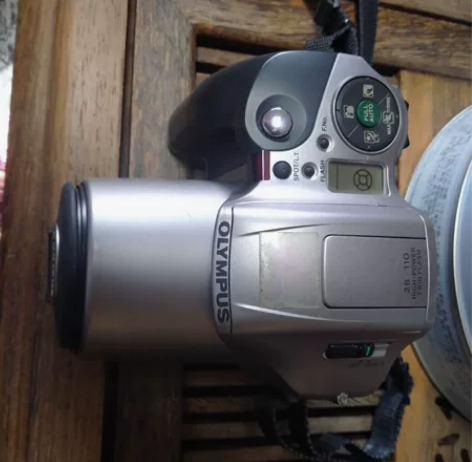 奥林帕斯胶卷相机 个头挺大，很压手，功能正...