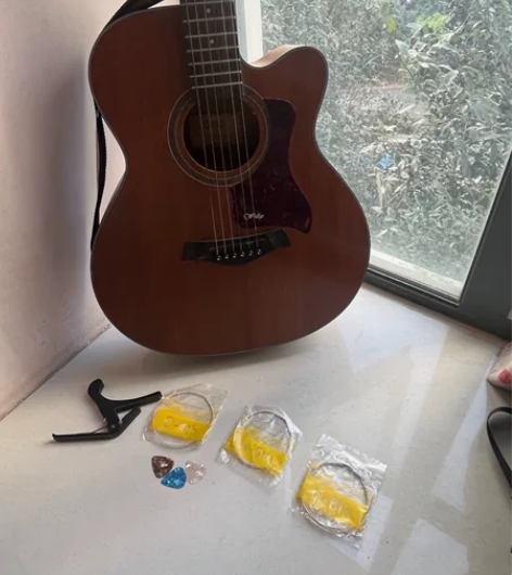 wellgo吉他 之前开琴行一直放在仓库 ...