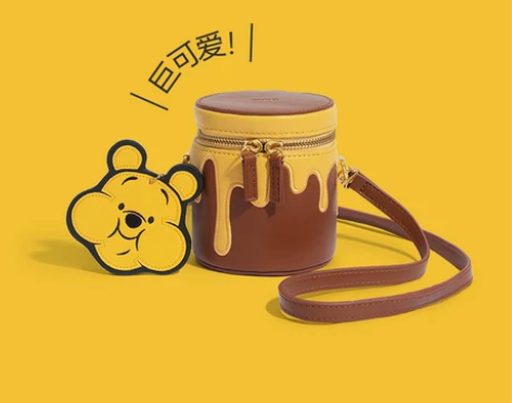 不莱玫迪士尼维尼熊蜜罐圆筒包单肩斜挎   ...