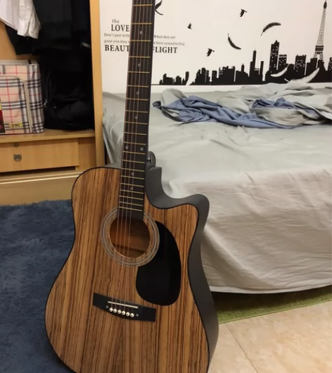纯木吉他，初学者合适，配件太多，夹子 调音...