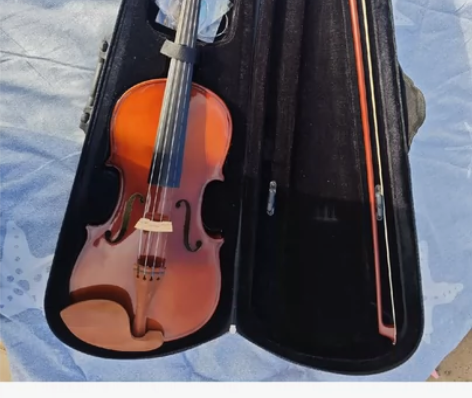 自用一手小提琴 换新的了 放在那里也是放着...