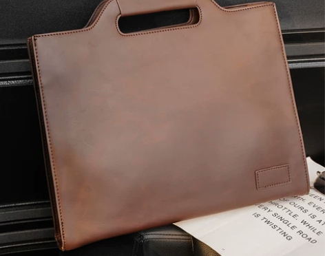 2023新款男手提包休闲青年单肩包商务公文...