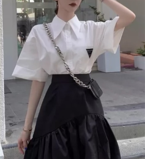 半身裙大码不规则荷叶边短裙2023春夏新款...