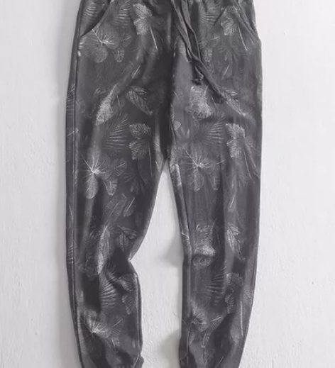 春装宽松运动树叶印花休闲裤男卫裤日系韩版修...