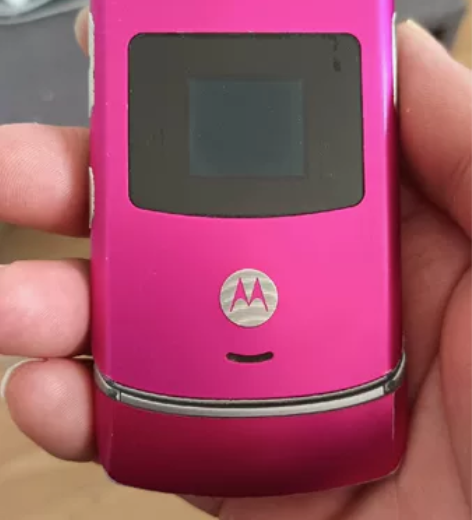 摩托罗拉V3橙色看图。80不包邮不包邮不包...