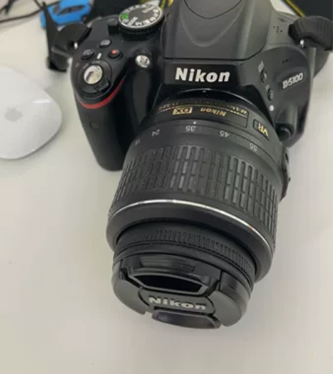 尼康单反D5100，带原装充电器，一块原装...