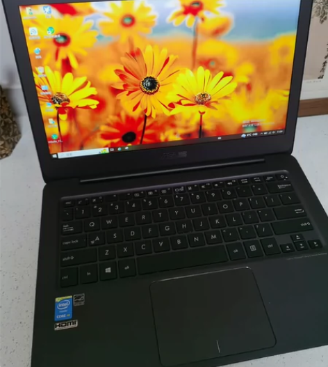 华硕笔记本电脑 超轻超薄 当年花将近6k买...