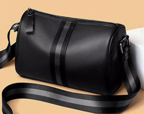 男士斜挎新款男包真皮质感外出旅行袋大容量网...