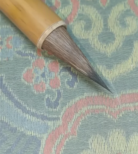 大尺寸黑尖缠纸紫毫，缠纸已经入管内，笔头非...