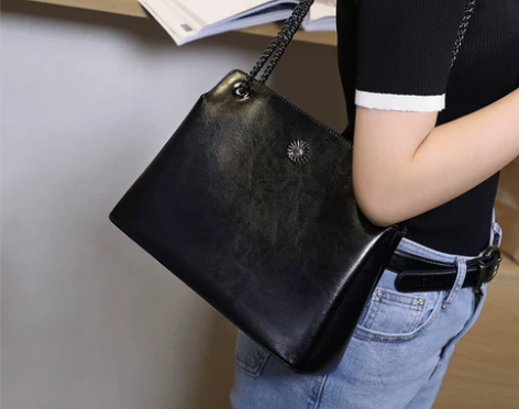 ?viney女包包2020新款潮真皮网红斜...