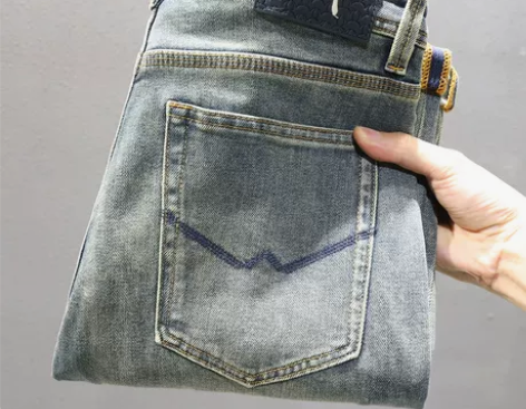 欧货大牌品质牛仔裤男弹力百搭复古做旧黄泥染...