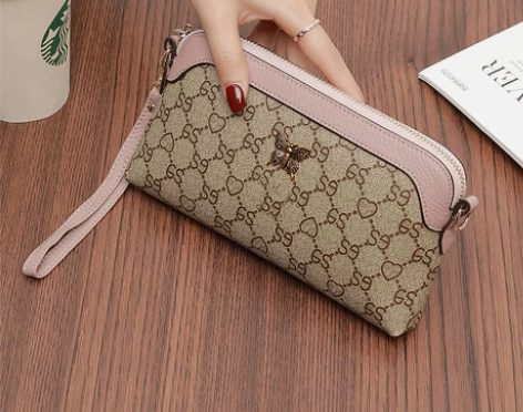 多层小众手拿包女士2024新款气质可放手机...