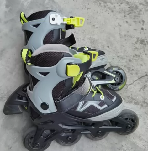 迪卡侬儿童溜冰鞋轮滑鞋 OXELO 黑黄款...