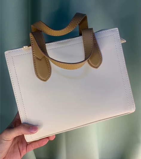 全新没有背过 稻草人包包女小众真皮白色女士...