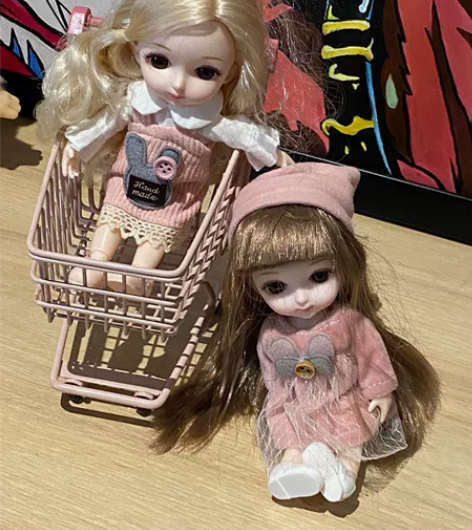 全新桌面摆件娃娃1个25 桌面购物车10元...