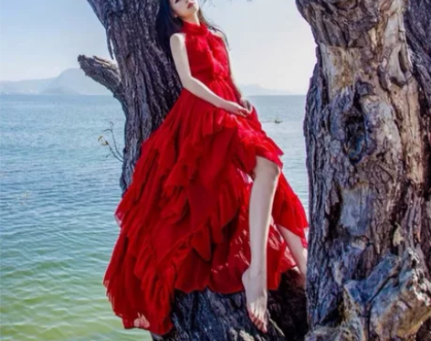 大红色森女不规则大摆荷叶边仙女裙大理海边度...