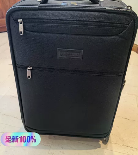 出全新黑色的24寸东航飞行行李箱，箱子采用...
