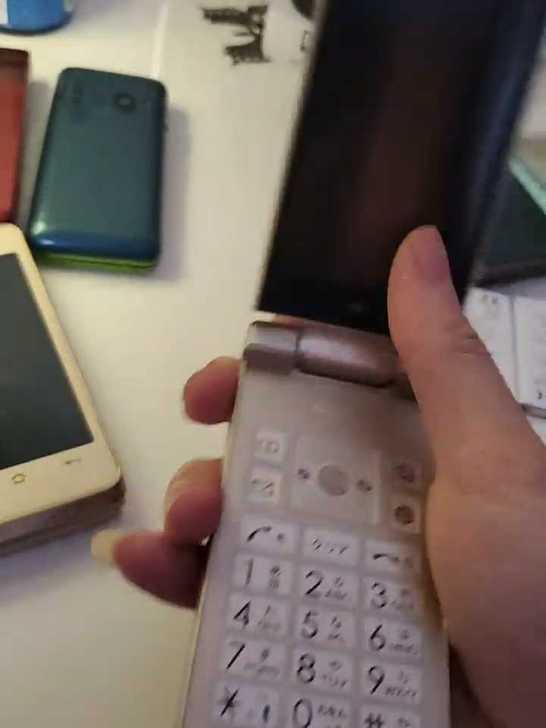 夏普shf33翻盖智能手机  白金色 超好...