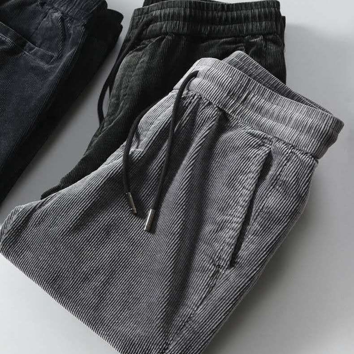 韩版灯芯绒男士束脚裤子春秋大码裤子男宽松加...