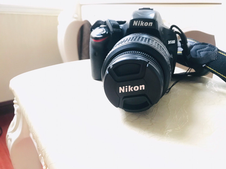 基本全新，尼康d5100套机，九成新，保修...