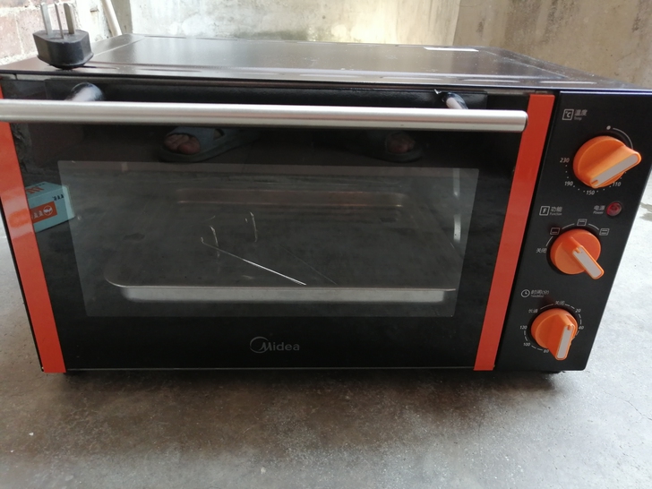美的电烤箱25L，功能正常成色如图。没有外...