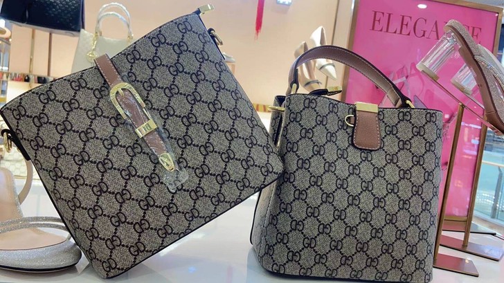 女士真皮包包品牌包包水桶包，点击我想要优惠卖