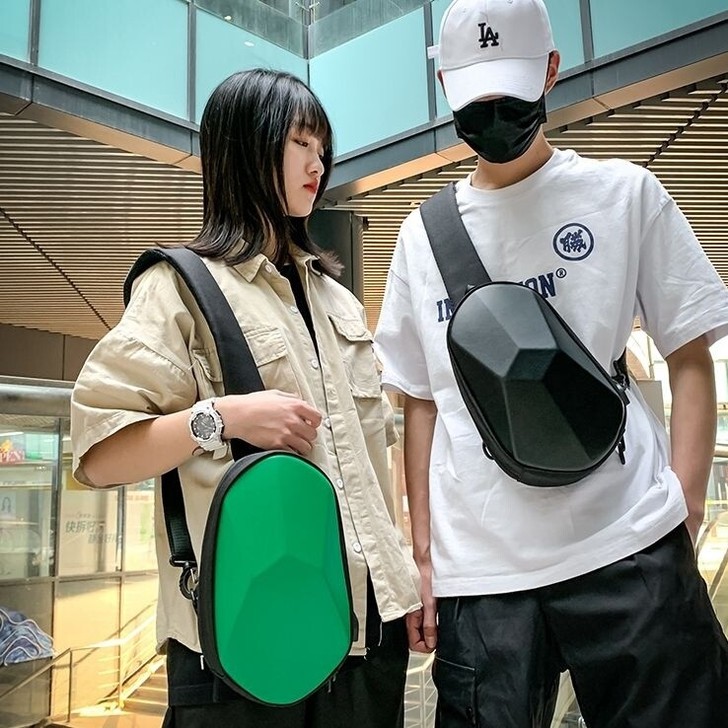 包包男女通用多面体斜挎硬壳防水机能背包骑行...