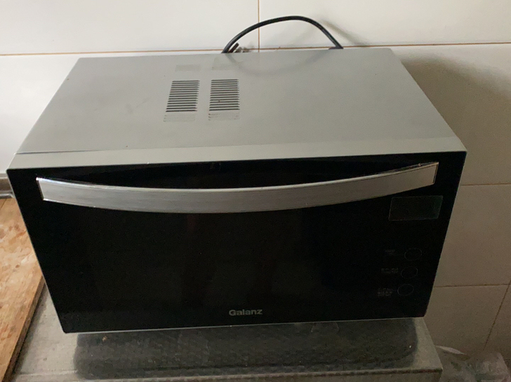 格兰仕微波炉9新，新的7百多买的