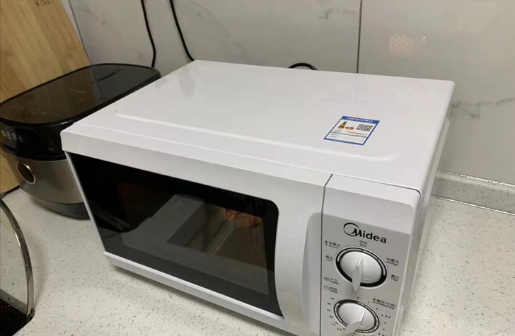 （9成新微波炉 包邮）美的微波炉 二手白美...