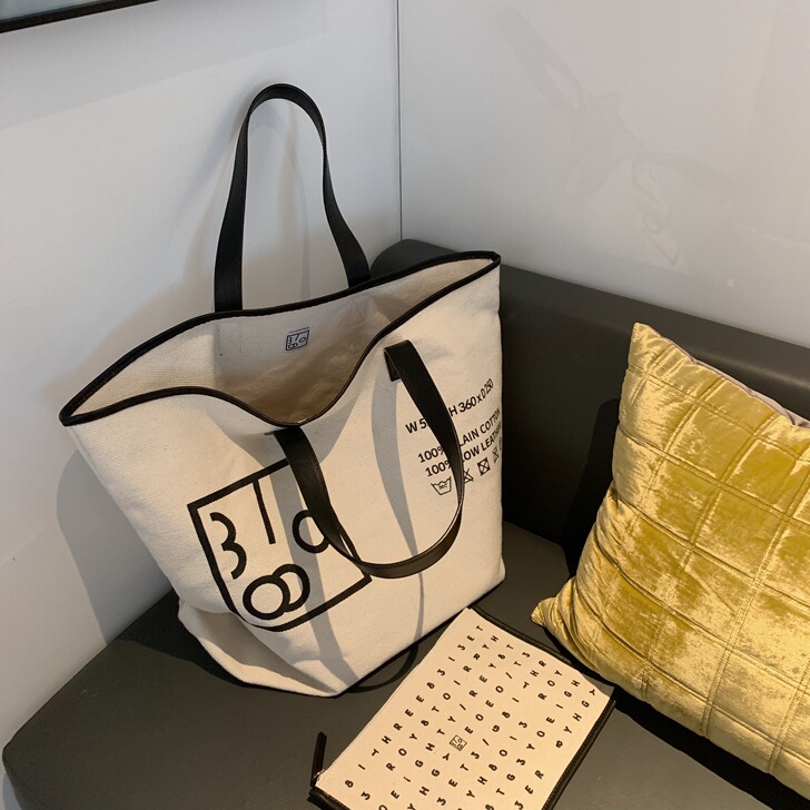 包包女2020新款ins大容量单肩帆布包慵...