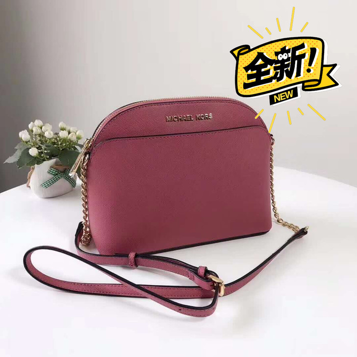 MK真皮贝壳单肩斜跨包牛皮 材质：牛皮 款...