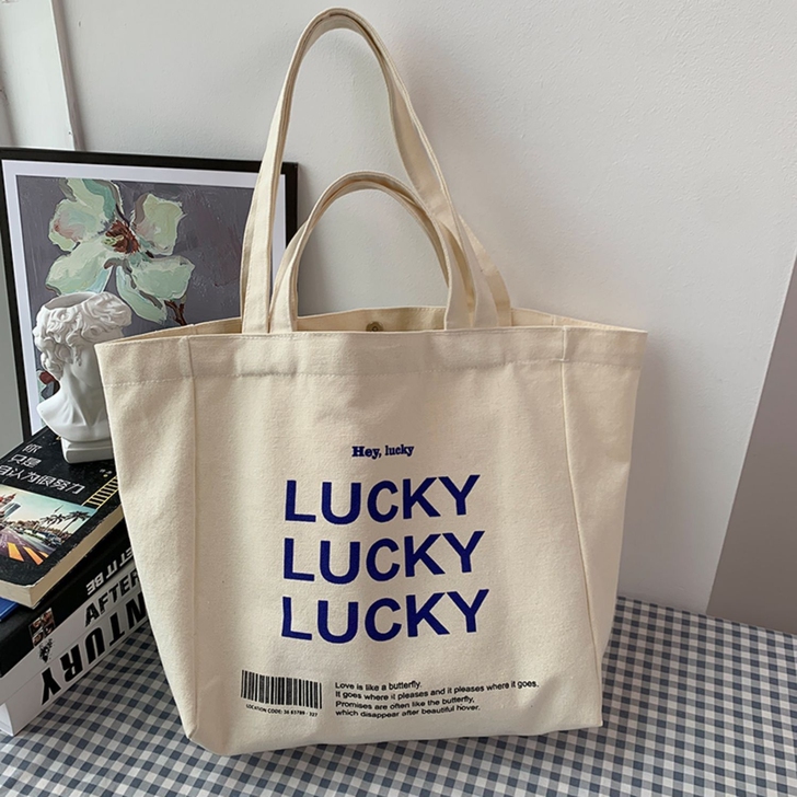 大容量帆布包 原宿风挎包 Lucky幸运包...