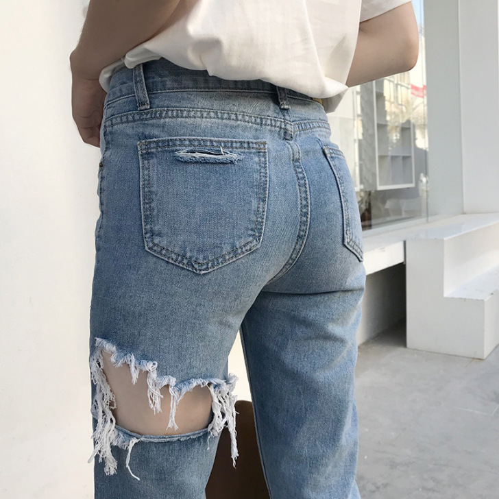 浅蓝色超火后破洞牛仔裤女夏设计感小众个性感...