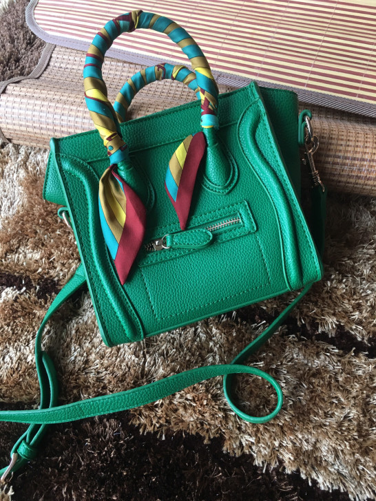 绿色小号笑脸包