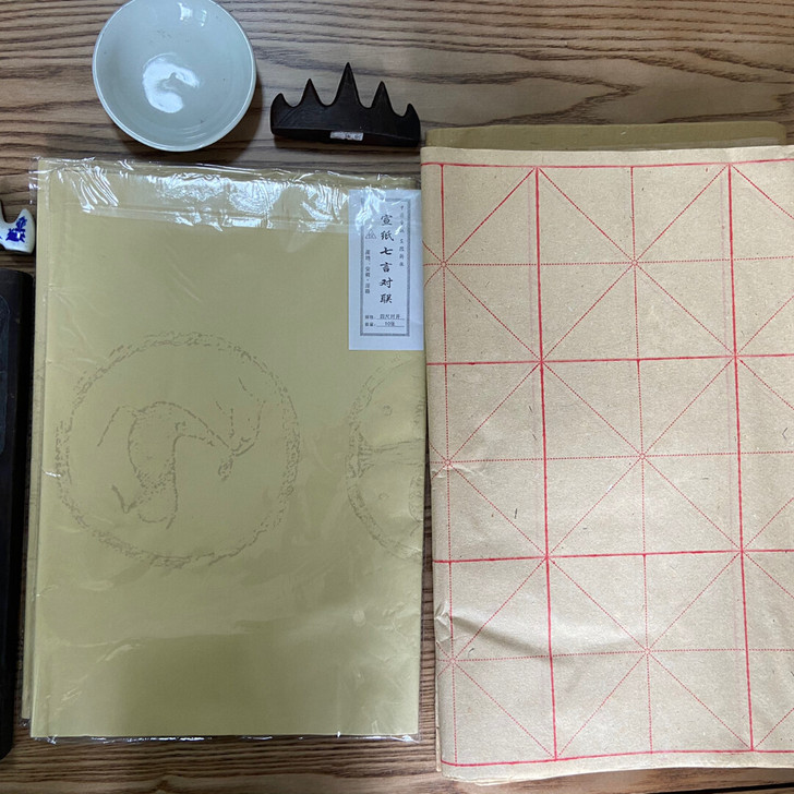 毛笔练习纸+七言对联宣纸x2+镇尺+大小两...