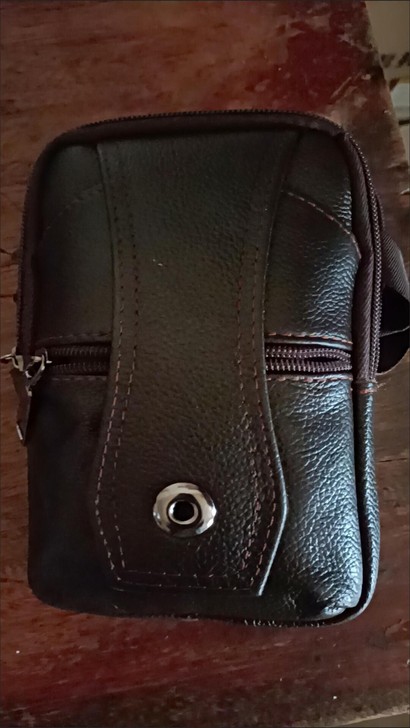现有一款全新男式手机腰包转让,腰包真皮材质...