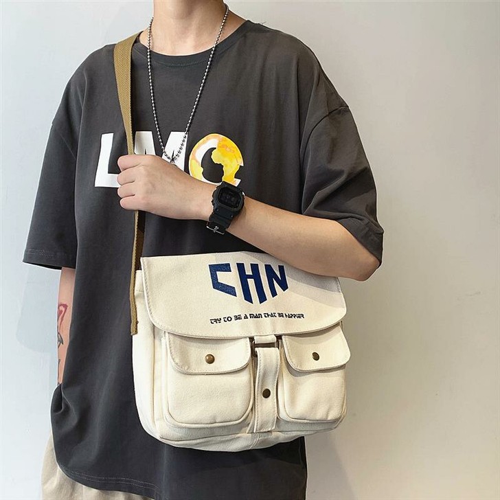 斜挎包男潮牌日系帆布包男士休闲单肩包学生大...