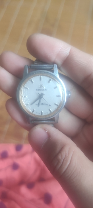 两块老手表   图一是上海牌手表   表蒙...
