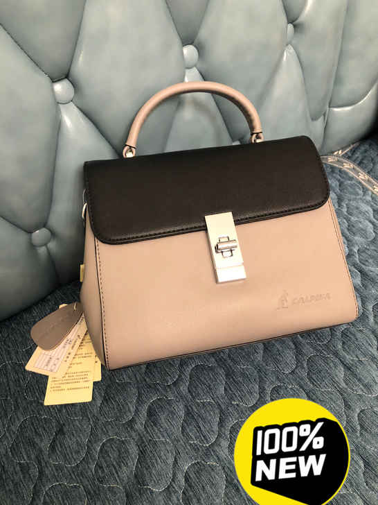 全新,正品袋鼠手提包,质量超级好,五金很精...