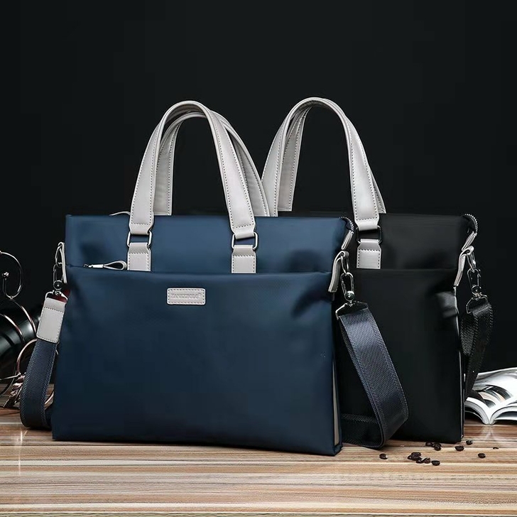 特价清仓男包牛津布男士手提包单肩斜跨包商务...