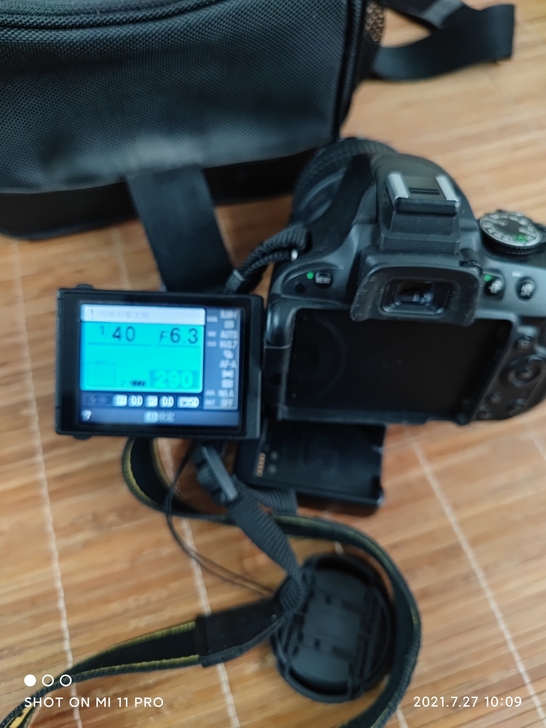 尼康D5100，用过几回，一直闲着99新，...