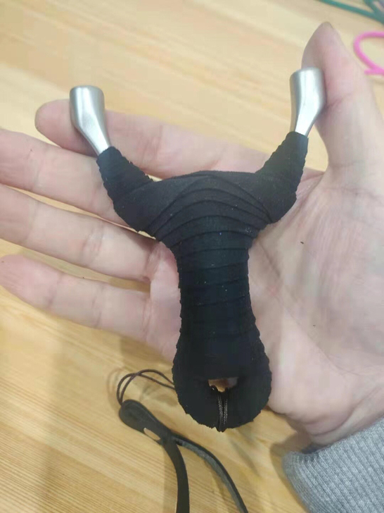 顶卡弹弓